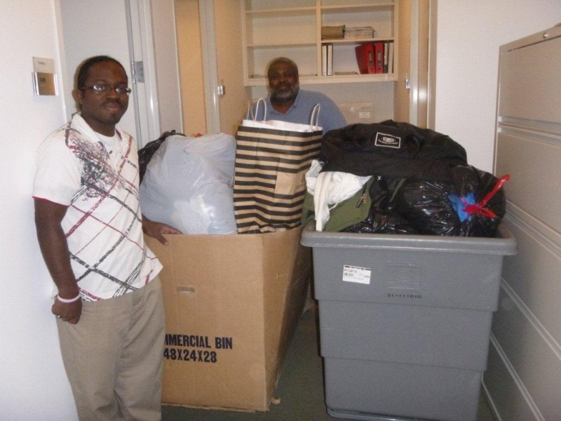 From left to right are Katten employees D’Angelo Moye and Terry Hanson 